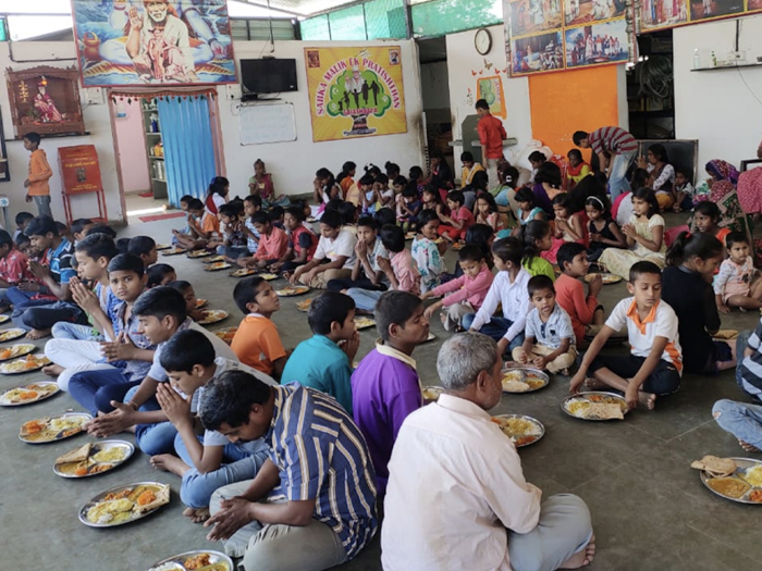 Weekly hot meals at Sai Ashray orphanage by charity for medical and food support