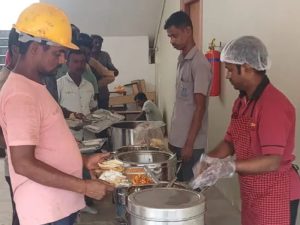 Hot meals for construction workers by healthcare NGO in memory of Shri P. P. Chhabria