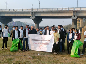 Volunteers supporting NGO river cleaning and environmental protection