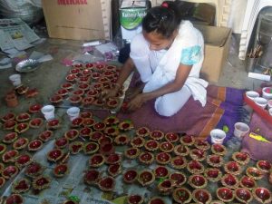 NGO for disabled women in India empowering them through diya-making skilling sessions