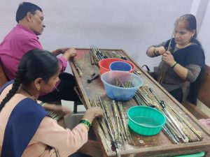 Handicapped NGO in India training differently-abled individuals in umbrella making