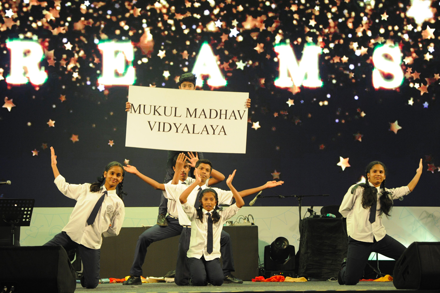 Mukul Madhav Vidyalaya children performing at NGO charity event in India