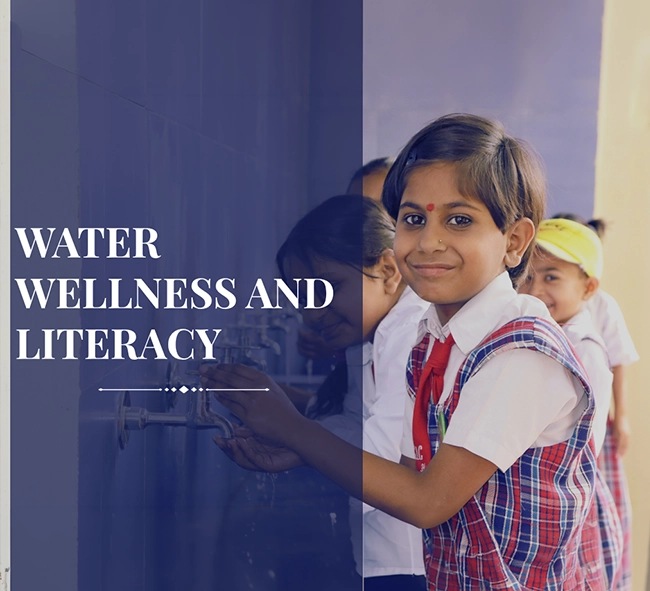Children accessing clean drinking water and WASH infrastructure in a rural Indian school supported by Mukul Madhav Foundation